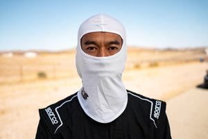 Man wearing White Track Armour Head Sock